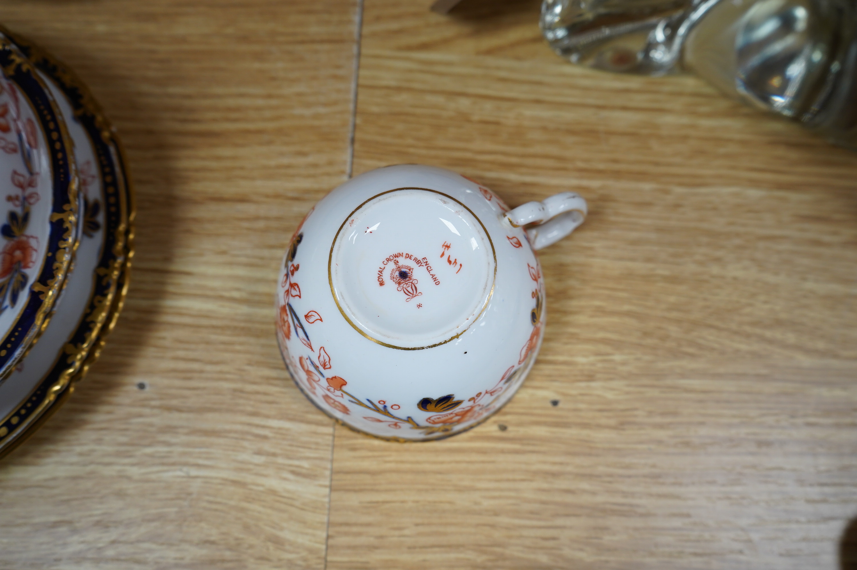 A Royal Crown Derby Imari porcelain part tea set to include sandwich plates, trios and milk jug. Condition - varies, some breaks